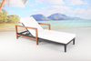 Hotel poolside rattan sun lounger with armrest