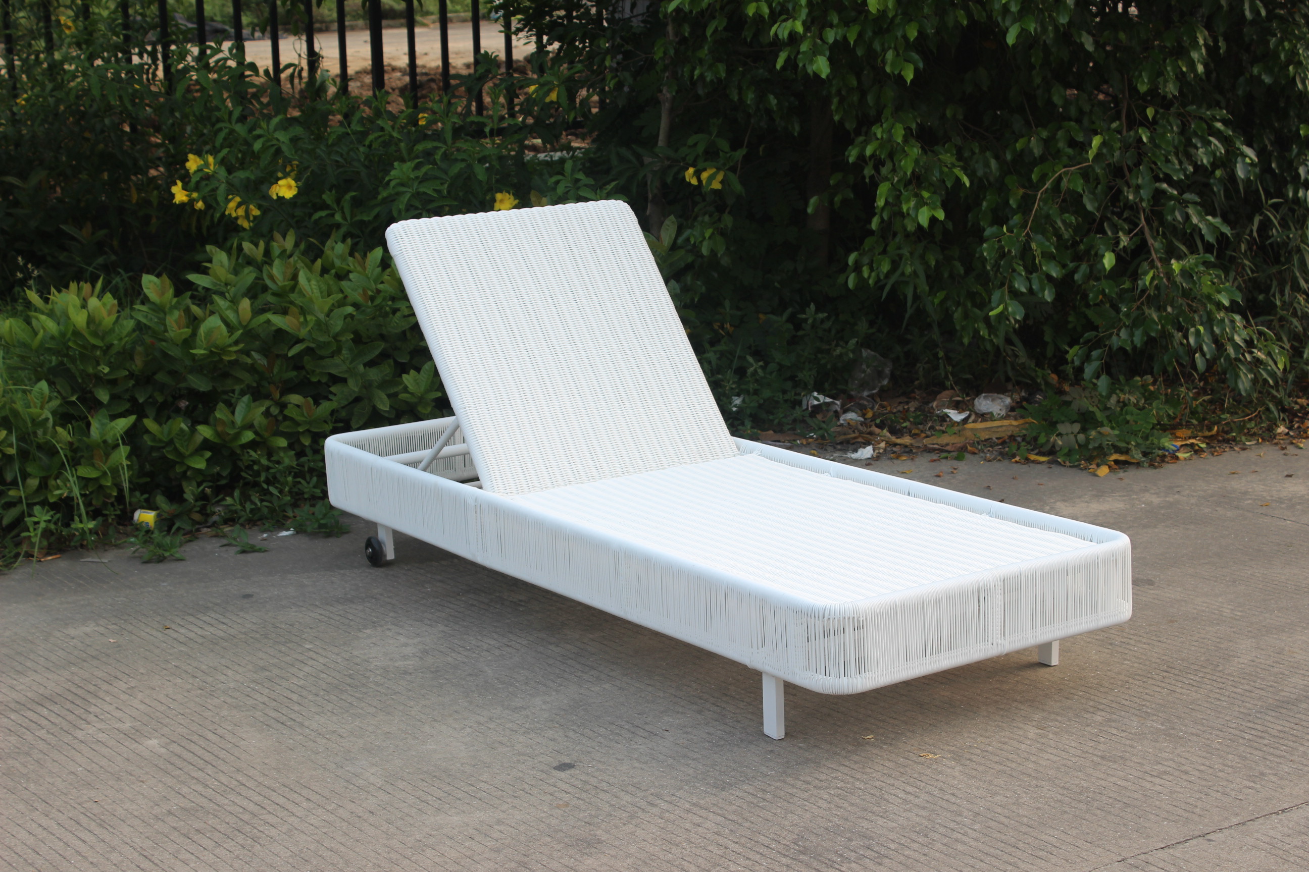 Outdoor beach white rattan sun lounger