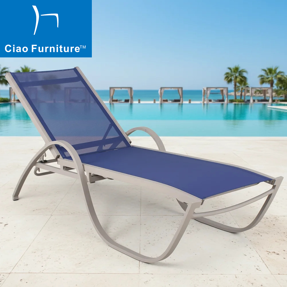 Outdoor patio pool chaise lounge chair with blue sling fabric 