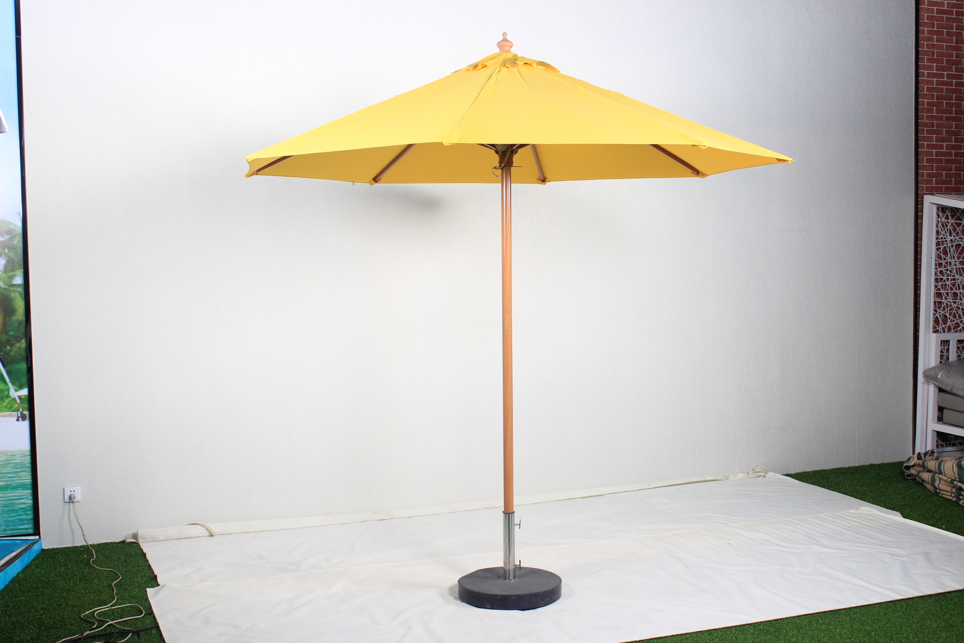 Big yellow garden parasol umbrella
