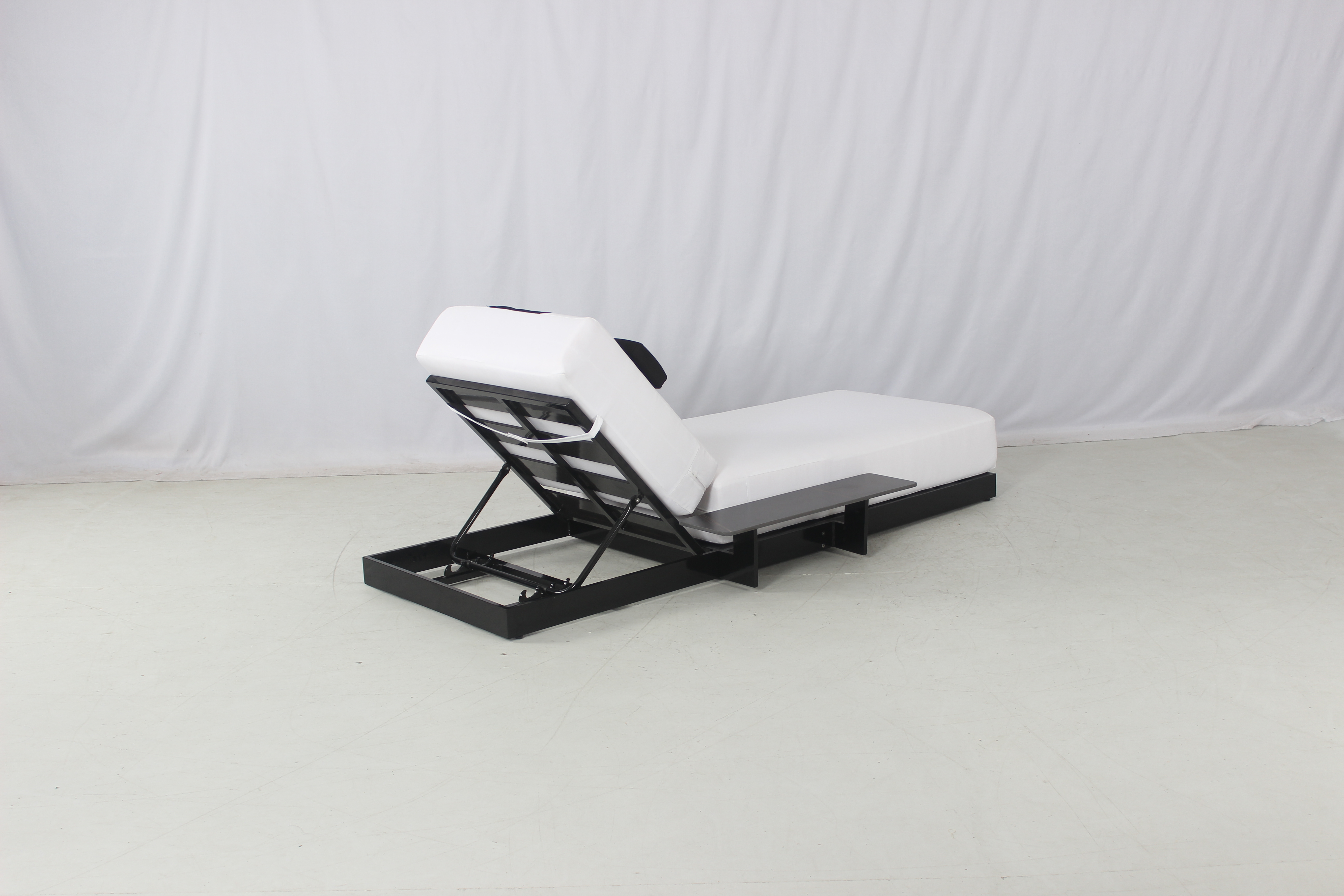 Luxury pool side outdoor black aluminum chaise lounge with thick white cushion