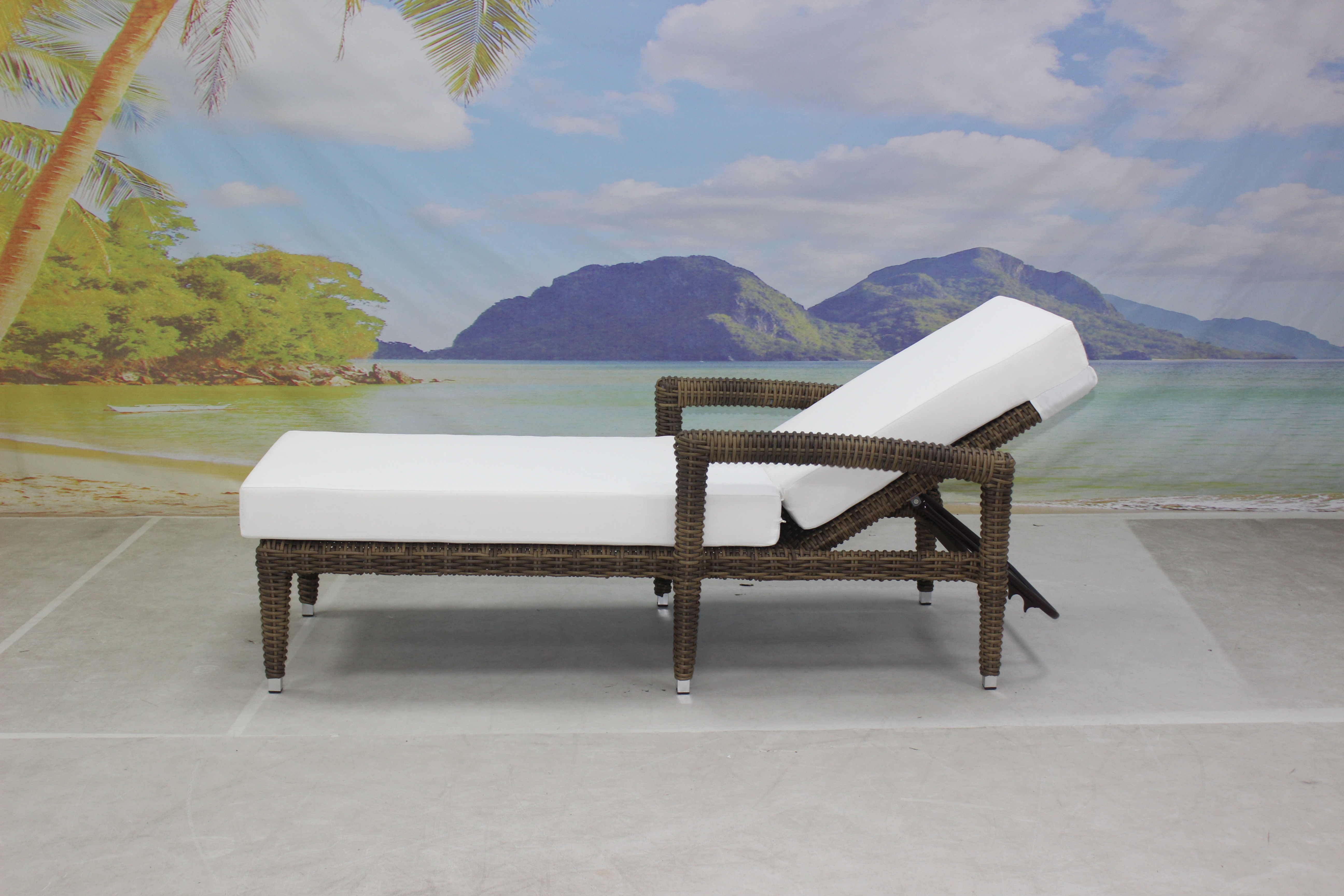 Outdoor hotel patio wicker reclining sun lounger