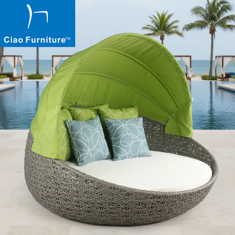 Resort outdoor wicker lounge daybed with green canopy 