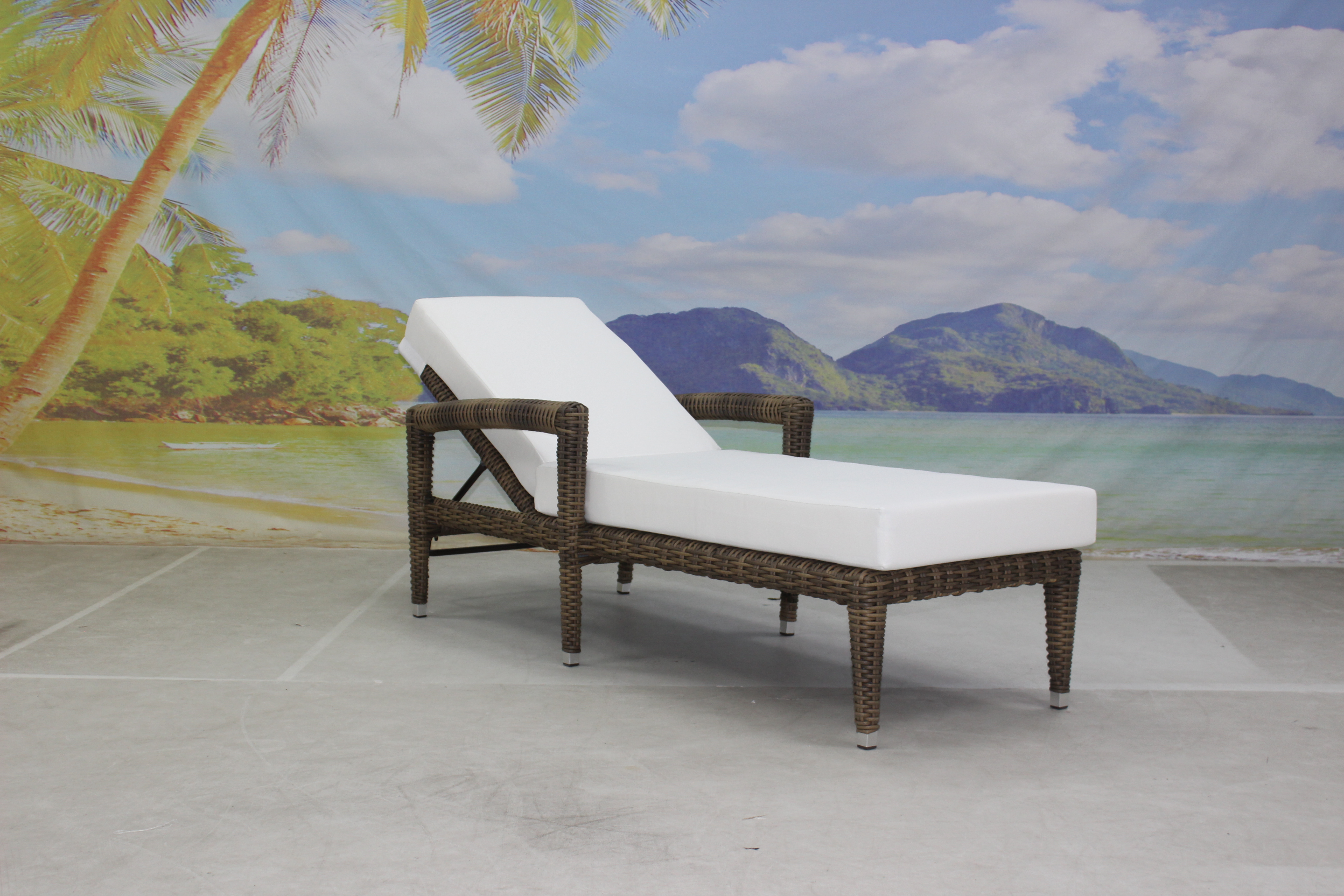 Outdoor hotel patio wicker reclining sun lounger