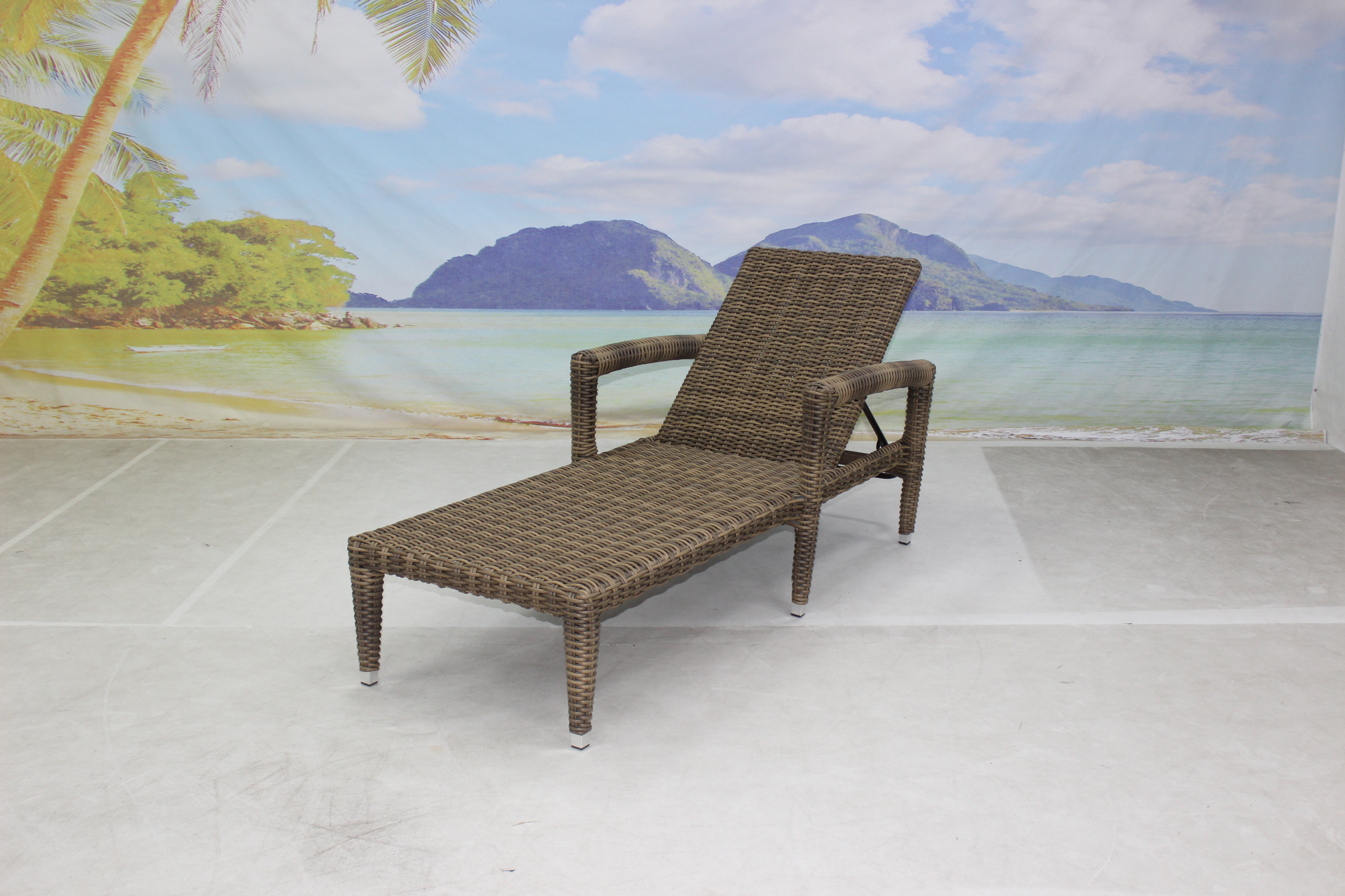 Outdoor hotel patio wicker reclining sun lounger