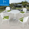 White terrace rattan chair and round coffee table set 