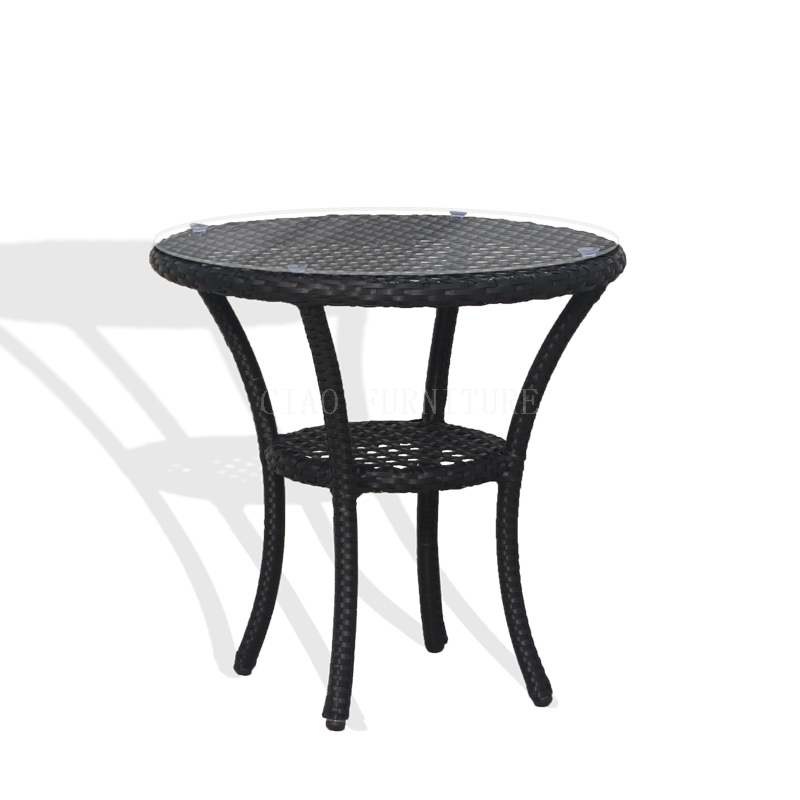 Round black rattan outdoor side table