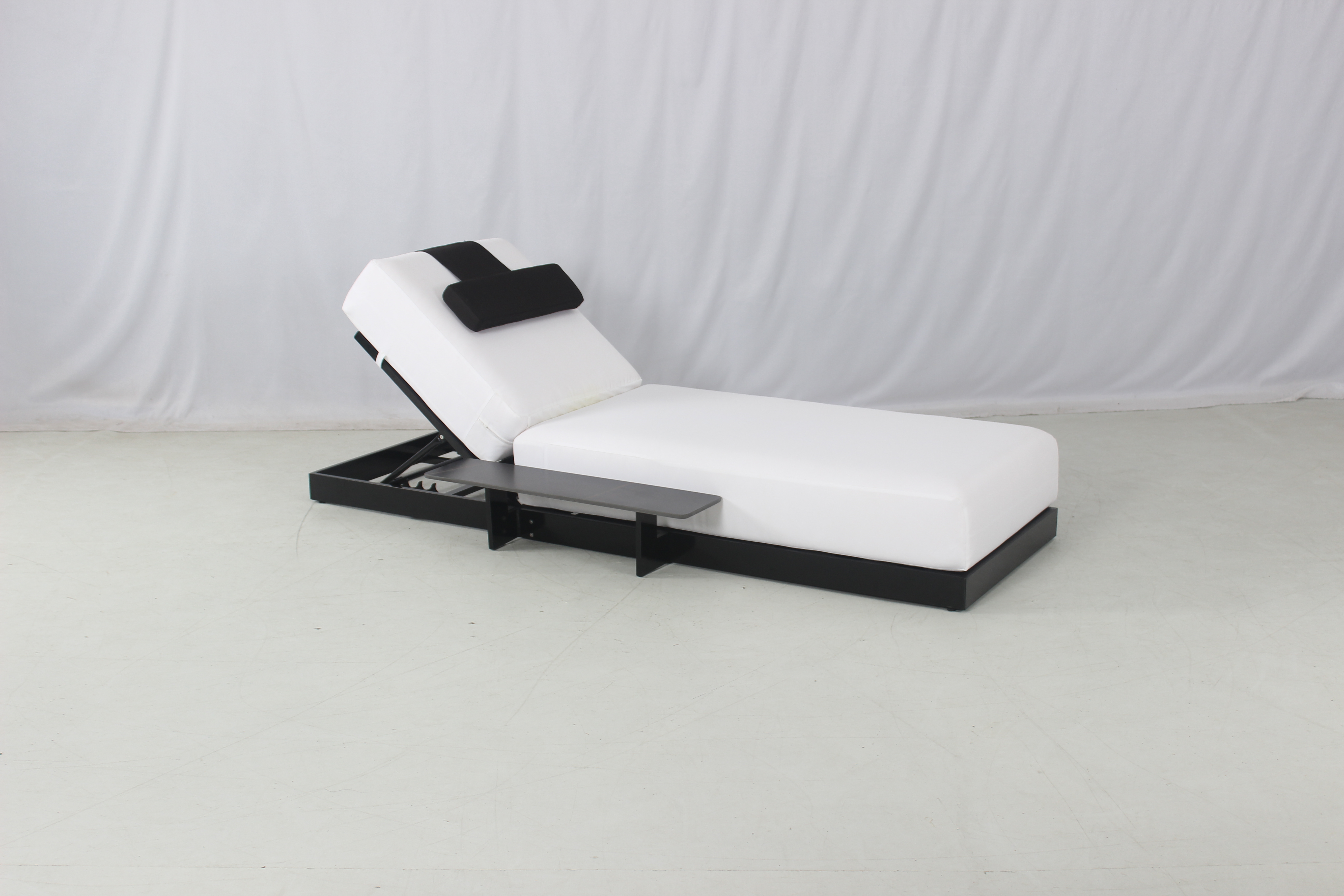 Luxury pool side outdoor black aluminum chaise lounge with thick white cushion
