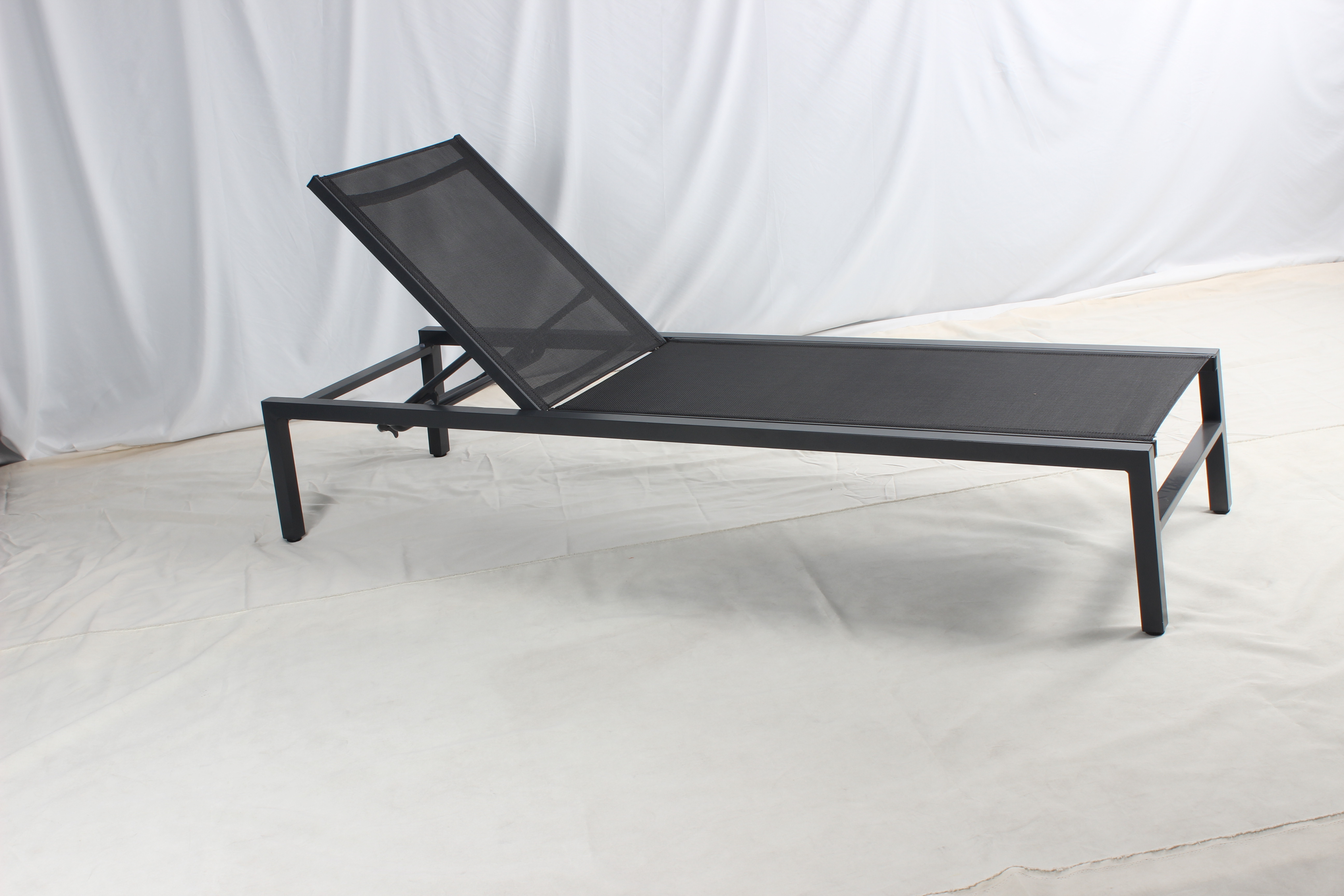 Patio aluminum chaise lounge chair with orange cushion